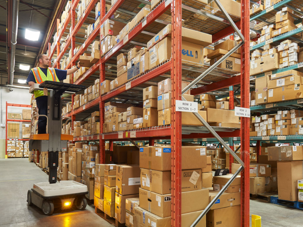 A laborer working in a warehouse